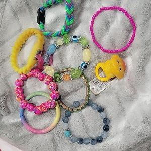 BUNDLE CHILD'S BRACELETS AND LIGHT UP RUBBER DUCKY RING